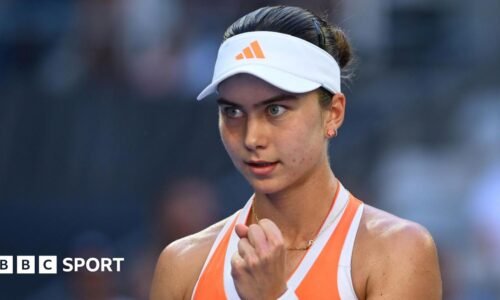 Iva Jovic clenches her fist in celebration at the Australian Open