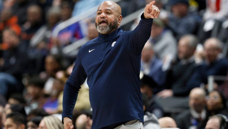J.B. Bickerstaff shouts to his team from the sidelines