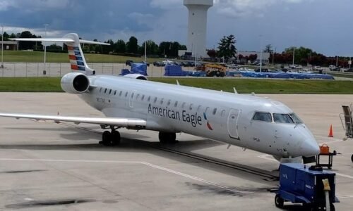 CRJ700 diverts after radome apparently holed during Washington take-off