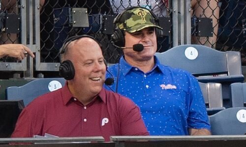 Ben Davis (right) alongside play-by-play announcer Tom McCarthy during a  2022 Phillies game.