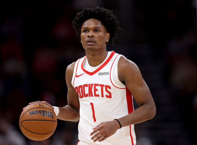 HOUSTON, TEXAS - FEBRUARY 05: Amen Thompson #1 of the Houston Rockets brings the ball up court in the first half against the Charlotte Hornets at Toyota Center on February 05, 2026 in Houston, Texas. NOTE TO USER: User expressly acknowledges and agrees that, by downloading and or using this photograph, User is consenting to the terms and conditions of the Getty Images License Agreement. (Photo by Tim Warner/Getty Images)