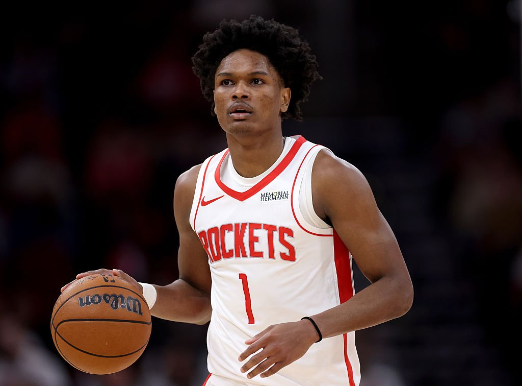 HOUSTON, TEXAS - FEBRUARY 05: Amen Thompson #1 of the Houston Rockets brings the ball up court in the first half against the Charlotte Hornets at Toyota Center on February 05, 2026 in Houston, Texas. NOTE TO USER: User expressly acknowledges and agrees that, by downloading and or using this photograph, User is consenting to the terms and conditions of the Getty Images License Agreement. (Photo by Tim Warner/Getty Images)