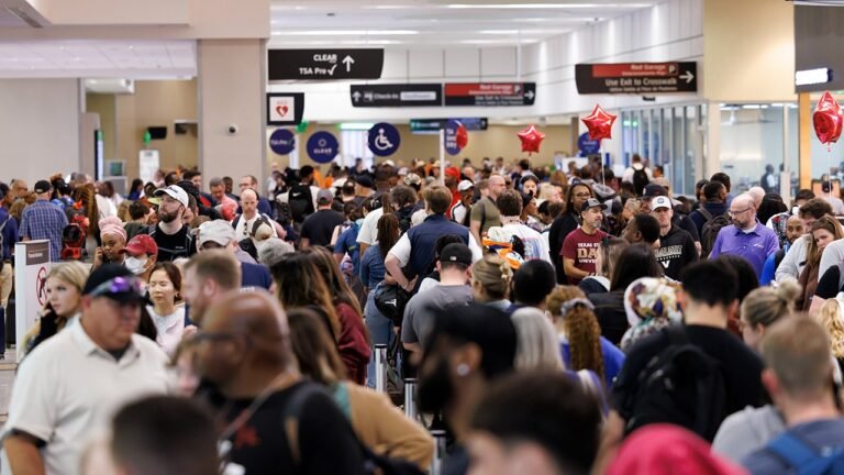American Airlines raises checked bag fees amid rising fuel costs