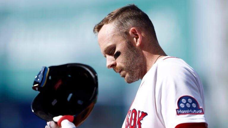 Boston Red Sox shortstop Trevor Story (10) reacts after grounding out resulting in a double play to end the fifth inning during the season home opener against the San Diego Padres at Fenway Park on April 3, 2026 in Boston.