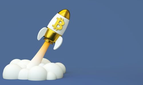Toy spaceship with Bitcoin logo launching.