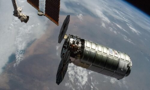 Northrop Grumman's Cygnus XL cargo craft, carrying over 11,000 pounds of new science and supplies for the Expedition 73 crew, is pictiured moments before its capture with the International Space Station's Canadarm2 robotic arm. Both spacecraft were orbiting 257 miles above Namibia. Cygnus XL is Northrop Grumman's expanded version of its previous Cygnus cargo craft increasing its payload capacity and pressurized cargo volume.