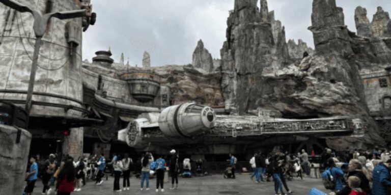 Crowds gather around the Millennium Falcon at Star Wars: Galaxy's Edge
