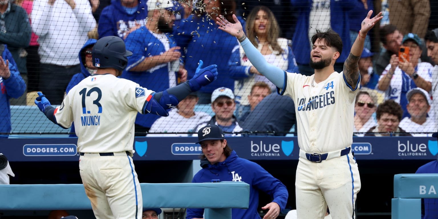 Dodgers score 12 runs to end Cubs' winning streak