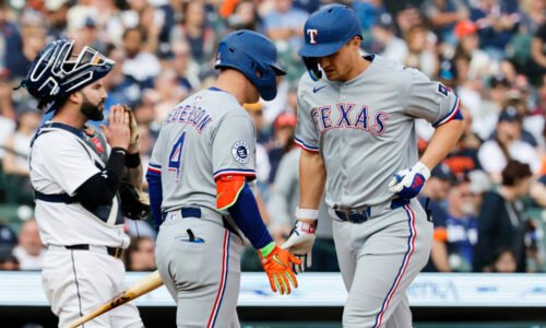 May 10, 2025; Detroit, Michigan, USA; Texas Rangers shortstop Corey Seager (5) receives congratulations from designated hitter Joc Pederson (4) after he hits a home run in the first inning against the Detroit Tigers at Comerica Park. Mandatory Credit: Rick Osentoski-Imagn Images