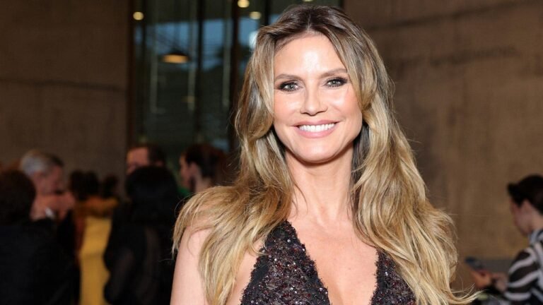 Heidi Klum shares sultry poolside bikini video with her three dogs in tow