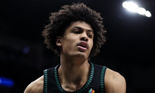 Feb 22, 2026; Minneapolis, Minnesota, USA; Minnesota Timberwolves forward Joan Beringer (19) looks on during the second half against the Philadelphia 76ers at Target Center. Mandatory Credit: Matt Krohn-Imagn Images