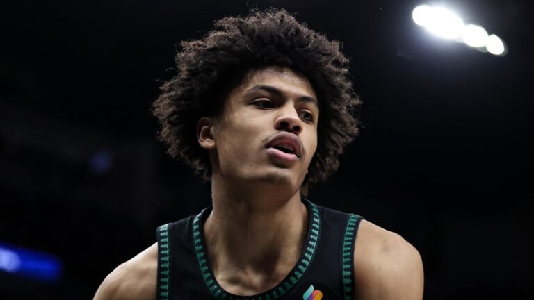 Feb 22, 2026; Minneapolis, Minnesota, USA; Minnesota Timberwolves forward Joan Beringer (19) looks on during the second half against the Philadelphia 76ers at Target Center. Mandatory Credit: Matt Krohn-Imagn Images