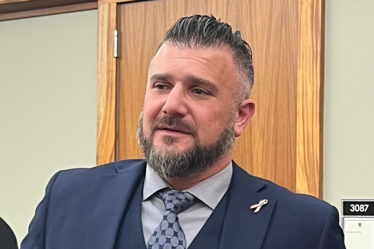 Rhode Island father Scott Naso reacts on Thursday after a Family Court judge dismisses his in-laws case for visits with his 4-year-old daughter over his objections.