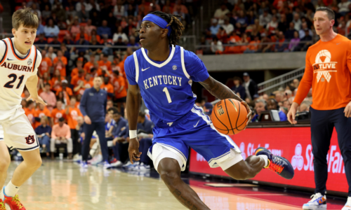Feb 21, 2026; Auburn, Alabama, USA; Kentucky Wildcats guard Denzel Aberdeen (1) runs a play against the Auburn Tigers during the first half at Neville Arena. Mandatory Credit: John Reed-Imagn Images