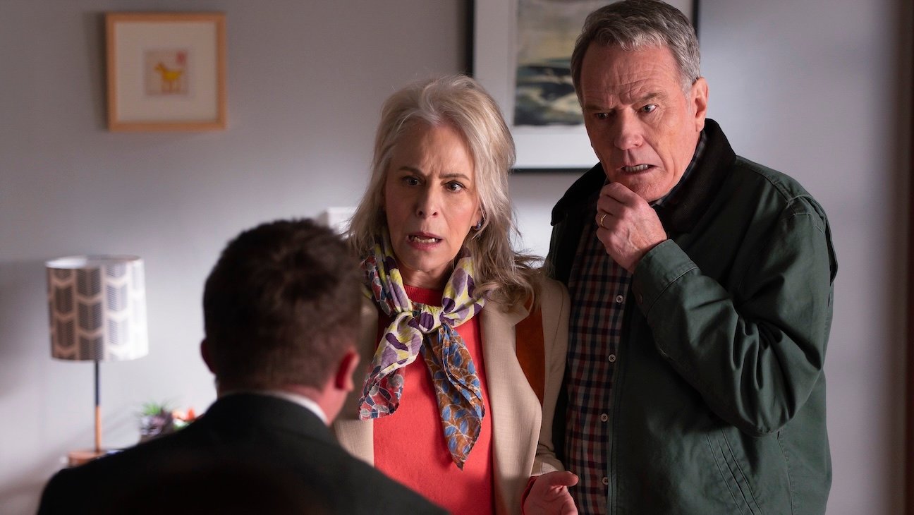 Frankie Muniz with back to camera, Jane Kaczmarek and Bryan Cranston in Malcolm in the Middle: Life’s Still Unfair