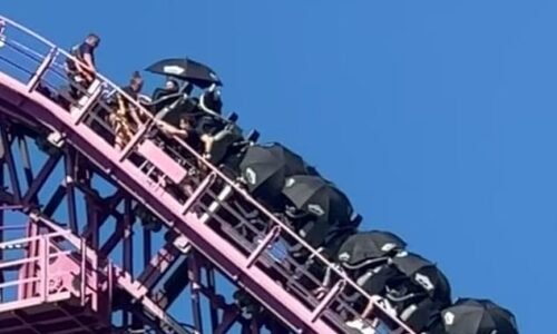 Riders get rescued from the DC Rivals HyperCoaster at Movie World on the Gold Coast on Wednesday