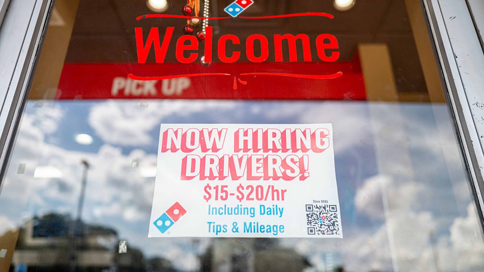 Stocks making the biggest moves premarket: QCOM, DPZ, ADBE