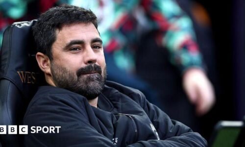 Vitor Matos sitting in the dugout