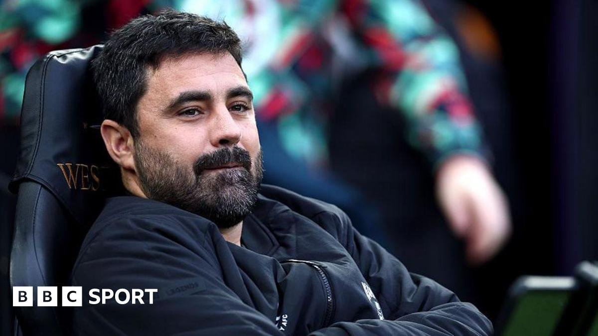 Vitor Matos sitting in the dugout