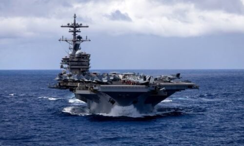 Third US aircraft carrier arrives in Middle East as Trump declines to give timeline on ending Iran war