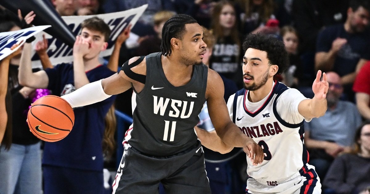 Feb 10, 2026; Spokane, Washington, USA; Washington State Cougars guard Jerone Morton (11) controls the ball against Gonzaga Bulldogs guard Braeden Smith (3) in the first half at McCarthey Athletic Center. Mandatory Credit: James Snook-Imagn Images