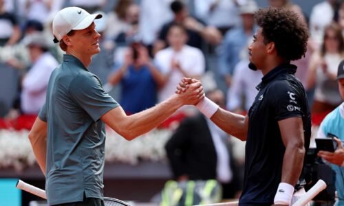 Jannik Sinner and Arthur Fils embrace following their Madrid semi-final on Friday.