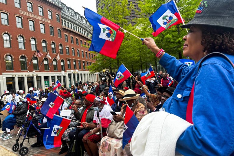 Eliane Garber, of Randolph, was among those who attended a Haitian flag-raising ceremony at Boston City Hall in May. (Simón Rios/WBUR)