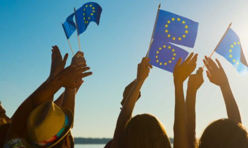 People waiving EU flags.