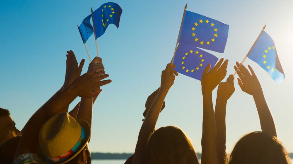 People waiving EU flags.