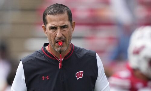 Sep 6, 2025; Madison, Wisconsin, USA; Wisconsin Badgers head coach Luke Fickell leads warm ups before a game against the Middle Tennessee Blue Raiders at Camp Randall Stadium. Mandatory Credit: Kayla Wolf-Imagn Images