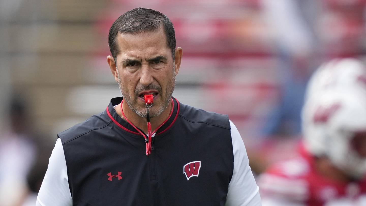 Sep 6, 2025; Madison, Wisconsin, USA; Wisconsin Badgers head coach Luke Fickell leads warm ups before a game against the Middle Tennessee Blue Raiders at Camp Randall Stadium. Mandatory Credit: Kayla Wolf-Imagn Images