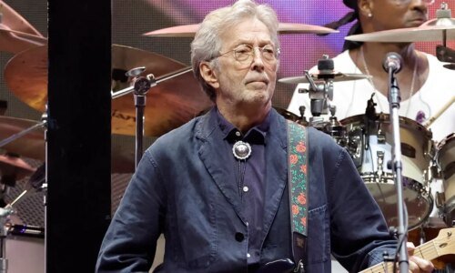 Eric Clapton hit by thrown object, leaves Madrid concert without encore