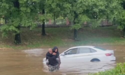 Georgia veteran rescues woman stranded on roof of car during major Atlanta floods on Downtown Connector