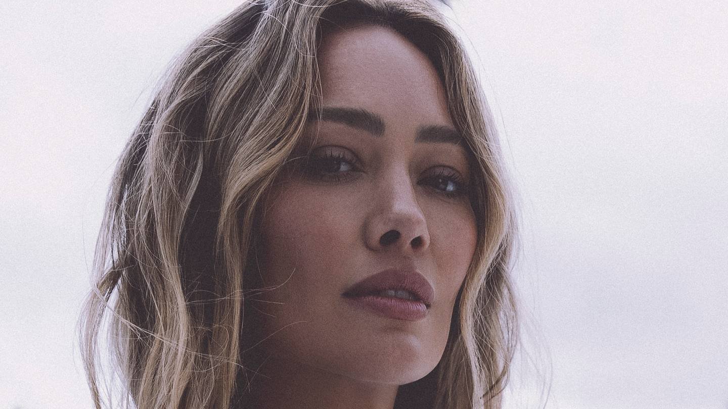 Hilary Duff was photographed by Kat Irlin in South Caicos. Swimsuit by Haight.