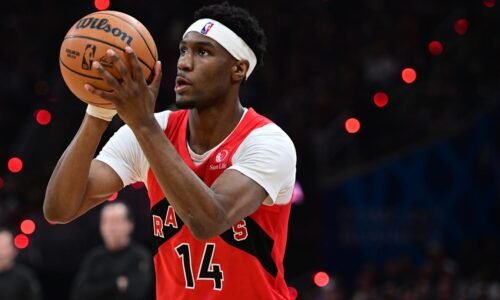 Apr 20, 2026; Cleveland, Ohio, USA; Toronto Raptors guard Ja'kobe Walter (14) shoots a three point basket during the second half during game two of the first round of the 2026 NBA Playoffs against the Cleveland Cavaliers at Rocket Arena. Mandatory Credit: David Dermer-Imagn Images