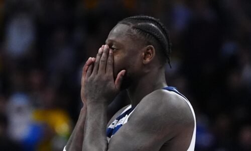 Minnesota Timberwolves forward Julius Randle (30) reacts to a flagrant foul called in overtime against the Denver Nuggets at Ball Arena on December 25, 2025.