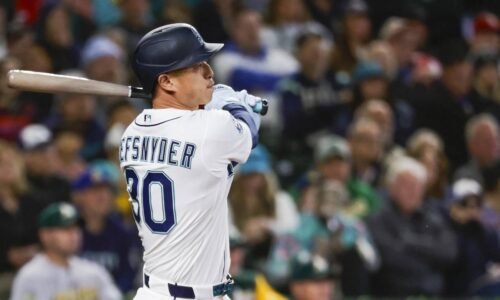 Apr 22, 2026; Seattle, Washington, USA; Seattle Mariners right fielder Rob Refsnyder (30) hits an RBI-sacrifice fly against the Athletics during the sixth inning at T-Mobile Park. Mandatory Credit: Joe Nicholson-Imagn Images