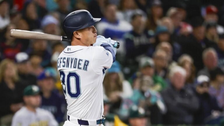 Apr 22, 2026; Seattle, Washington, USA; Seattle Mariners right fielder Rob Refsnyder (30) hits an RBI-sacrifice fly against the Athletics during the sixth inning at T-Mobile Park. Mandatory Credit: Joe Nicholson-Imagn Images