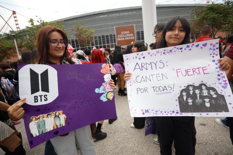 Fans of the Korean K-pop group BTS hold up signs before a concert at the GNP Stadium in Mexico City, Mexico, May 7. EPA-Yonhap