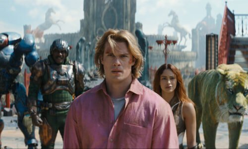 (l-r): Roboto (Kristen Wiig), Man At Arms (Idris Elba), Adam (Nicholas Galitzine), Teela (Camila Mendes) and Cringer in Masters of the Universe.