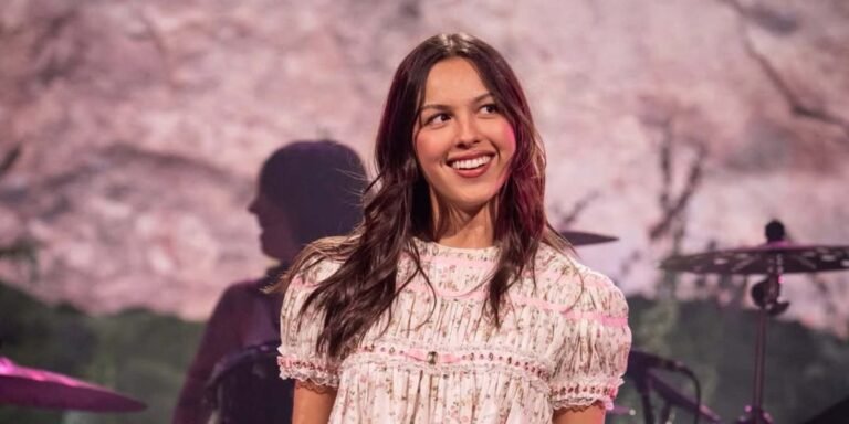 Olivia Rodrigo Performs in Barcelona in a Babydoll Dress and Boots
