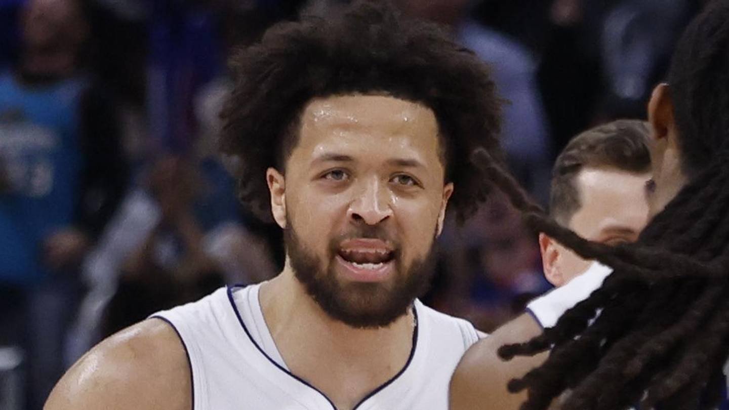 Detroit Pistons guard Daniss Jenkins (24) receives congratulations from guard Cade Cunningham (2) during the second half against the Orlando Magic during game seven of the first round of the 2026 NBA Playoffs at Little Caesars Arena on May 3, 2026.