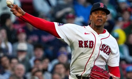 Red Sox pitcher Brayan Bello fires to first base for the out after fielding a grounder in the second inning.