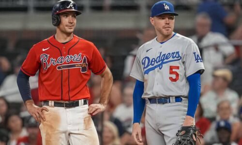 Atlanta Braves first baseman Matt Olson on base next to Los Angeles Dodgers first baseman Freddie Freeman.