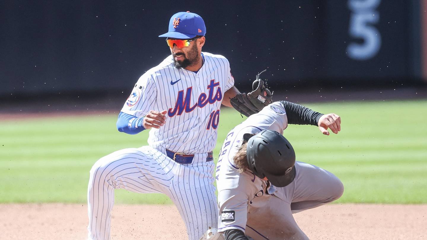 Apr 26, 2026; New York City, New York, USA; New York Mets second baseman Marcus Semien (10) tags out Colorado Rockies center fielder Jake McCarthy (31) in the seventh inning at Citi Field. Mandatory Credit: Wendell Cruz-Imagn Images