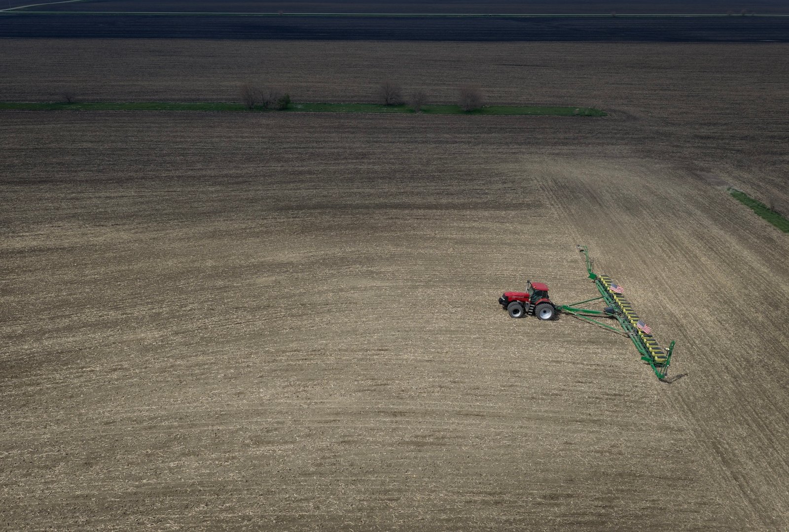 An aerial view shows Alan Montag, a third-generation Iowa farmer, planting soybeans on farmland he leases on May 06, 2026 near West Bend, Iowa. As the spring planting season moves into full swing, farmers are facing big spikes in fuel and fertilizers costs overs last spring due to the war with Iran. (Photo by Scott Olson/Getty Images)
