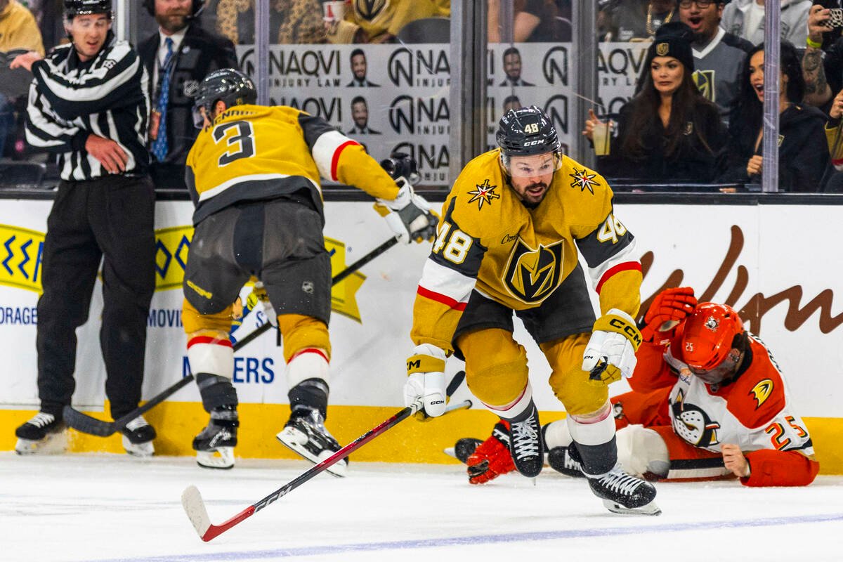 Golden Knights defenseman Brayden McNabb (3) collides into Anaheim Ducks center Ryan Poehling ( ...