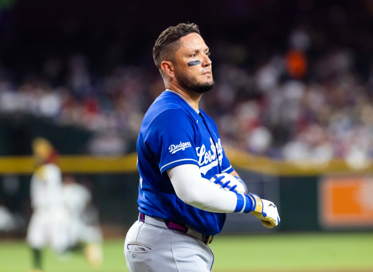Jun 1, 2026; Phoenix, Arizona, USA; Los Angeles Dodgers batter Miguel Rojas reacts after being called out on strikes via ABS challenge in the fourth inning against the Arizona Diamondbacks at Chase Field. Mandatory Credit: Mark J. Rebilas-Imagn Images