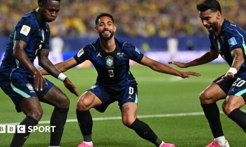 Matheus Cunha celebrates with his Brazil team-mate