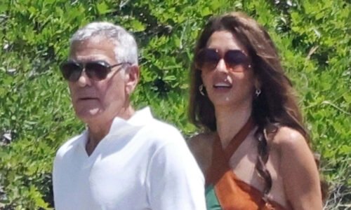 George Clooney's wife Amal looks straight out of the Flintstones in leg-baring tasselled dress